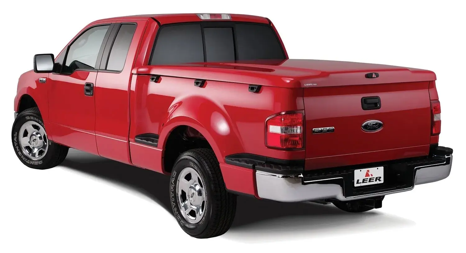 Red pickup truck with tonneau